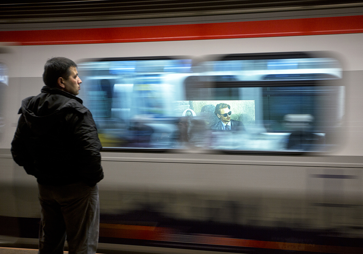 #17 —Taksim, Hacıosman Subway Line - 
A cold and rainy day.
On his way home.

